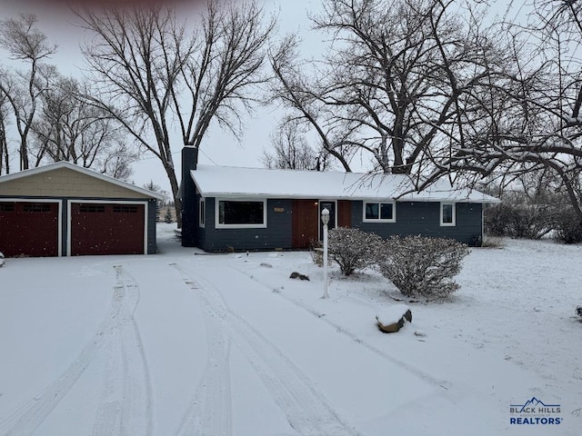 ranch-style home with a garage