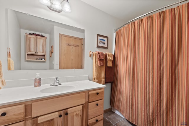 bathroom featuring tile patterned floors and vanity