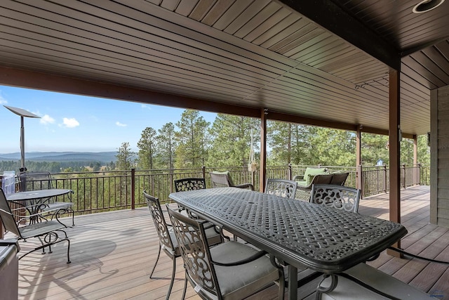 wooden deck featuring a mountain view