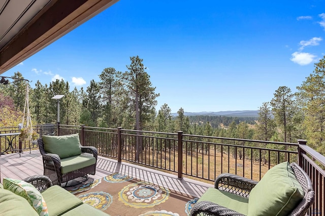 exterior space with outdoor lounge area and a wooden deck