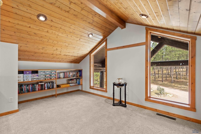 bonus room featuring carpet flooring, lofted ceiling with beams, and wooden ceiling