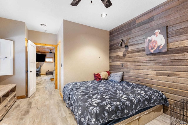 bedroom featuring ceiling fan and light hardwood / wood-style floors