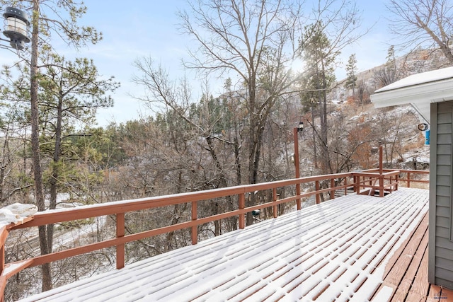 view of snow covered deck