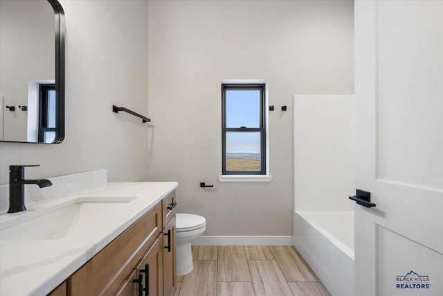 full bathroom with separate shower and tub, hardwood / wood-style floors, vanity, and toilet