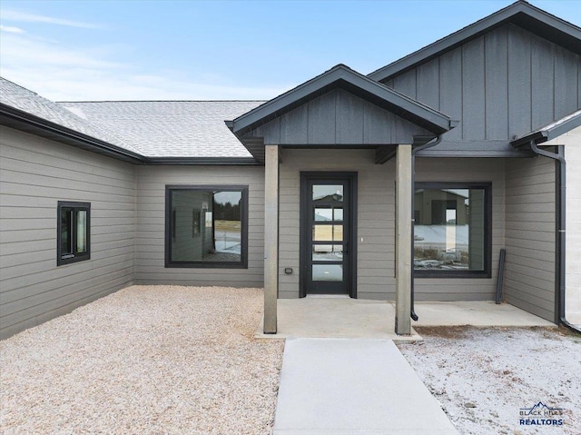 doorway to property with a patio area