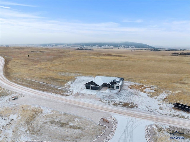 birds eye view of property featuring a rural view