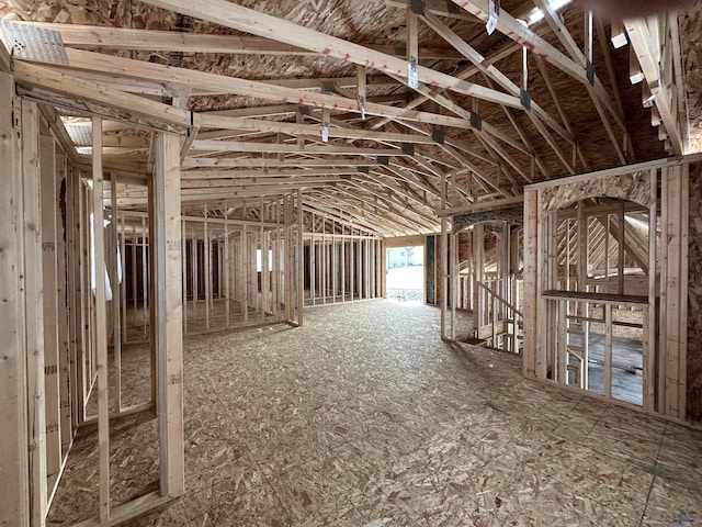 misc room with lofted ceiling