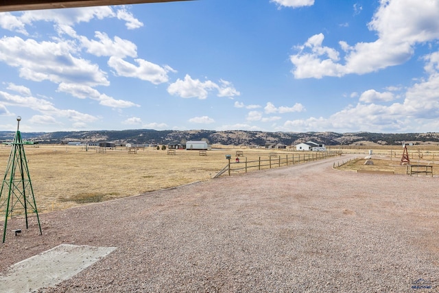 exterior space featuring a mountain view and a rural view