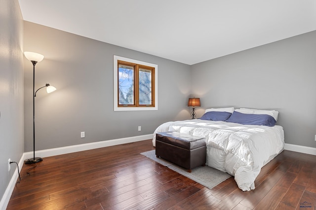 bedroom featuring dark hardwood / wood-style floors