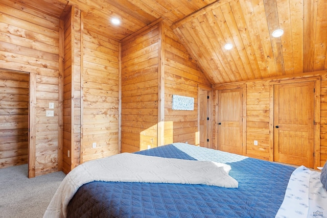 bedroom with carpet floors, wooden ceiling, and wood walls