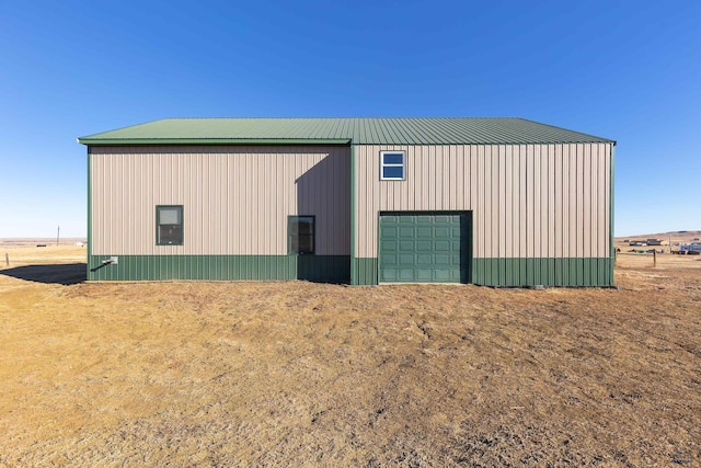 view of outdoor structure featuring a garage