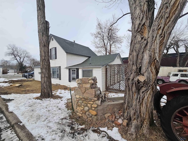 view of snow covered property