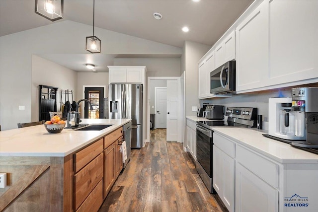 kitchen featuring sink, white cabinetry, and stainless steel appliances