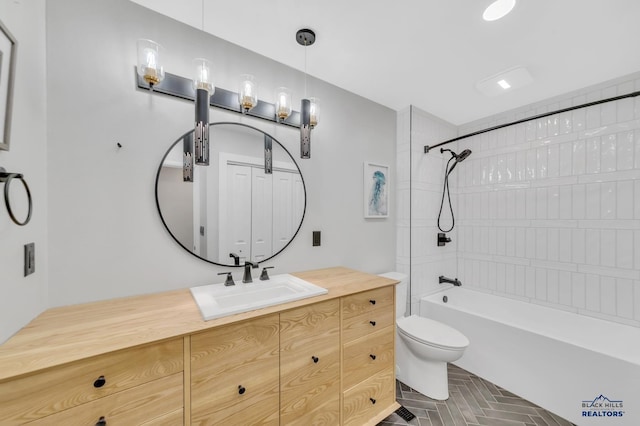 full bathroom with vanity, bathing tub / shower combination, and toilet