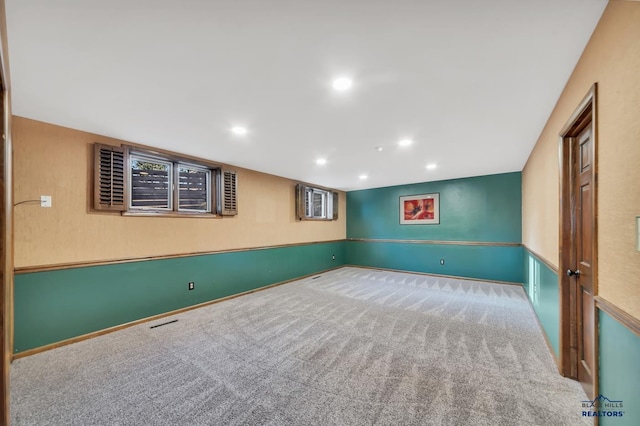 basement featuring carpet flooring