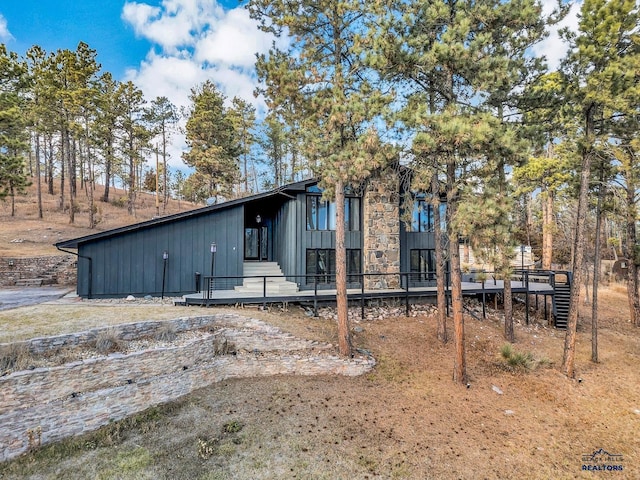 exterior space featuring a wooden deck