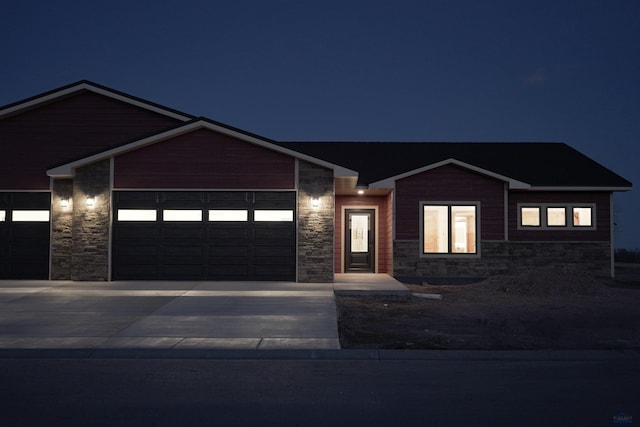 view of front of home with a garage