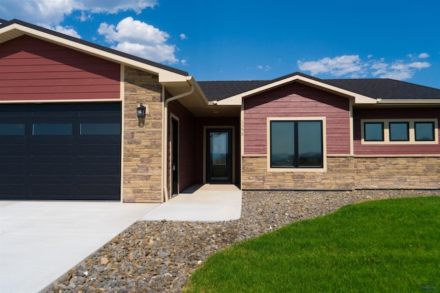 1152 Single Tree Dr Lot 24A, Piedmont, SD 57769 - ranch-style house with stone siding, an attached garage, and driveway