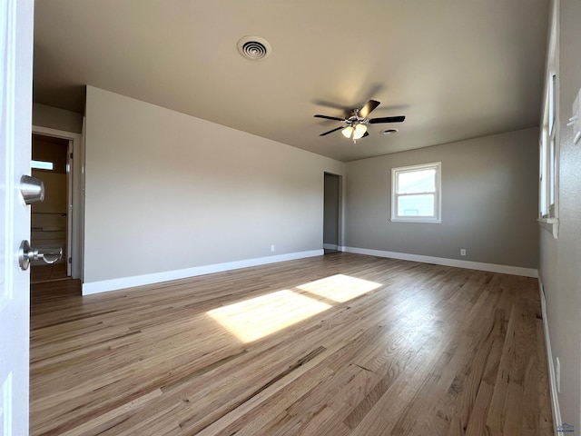 unfurnished room featuring ceiling fan and light hardwood / wood-style floors