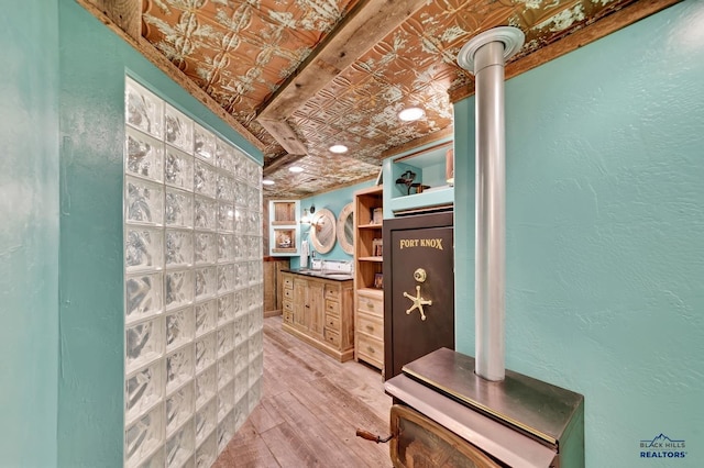 interior space with hardwood / wood-style flooring and vanity