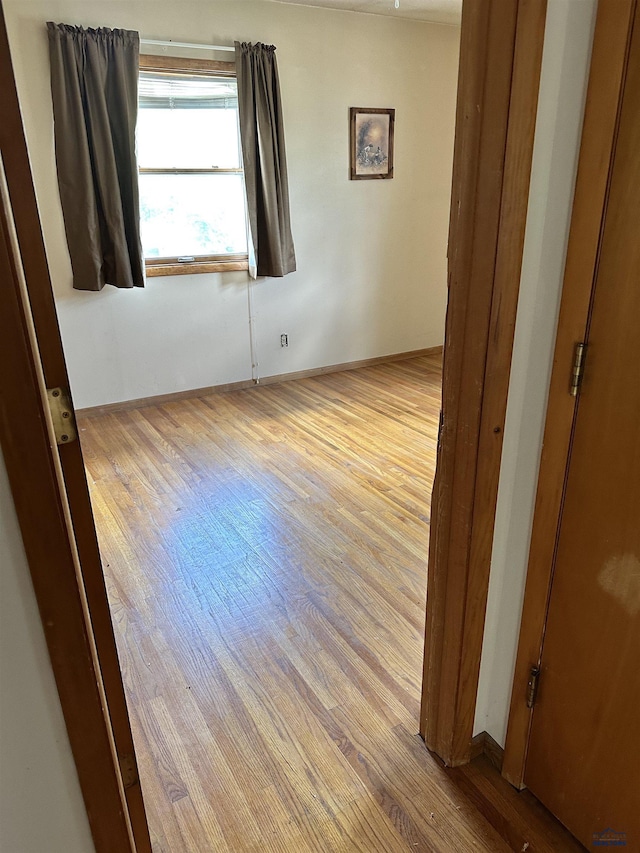 empty room featuring light hardwood / wood-style floors