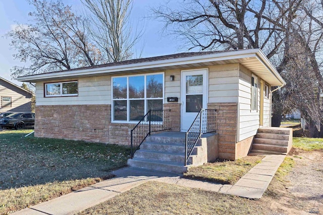 view of front of house with a front yard