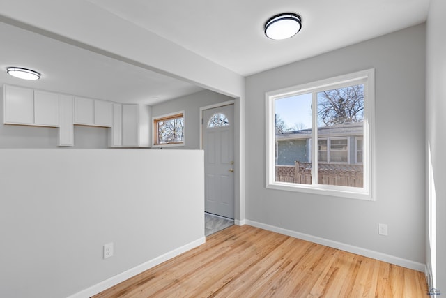 foyer entrance featuring light hardwood / wood-style flooring