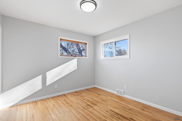 empty room featuring light wood-type flooring