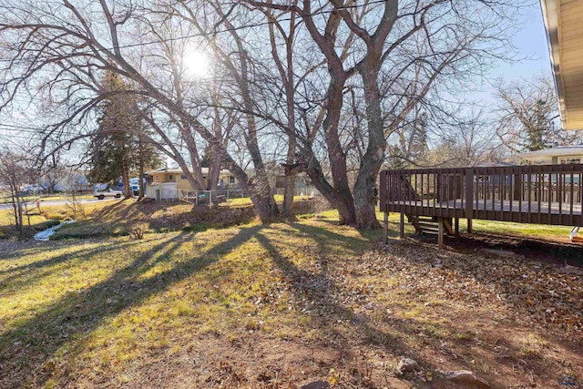 view of yard featuring a deck