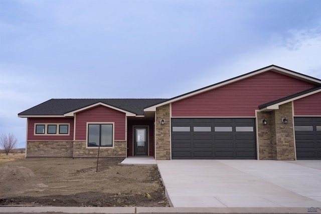 ranch-style home with a garage