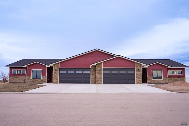 single story home featuring a garage