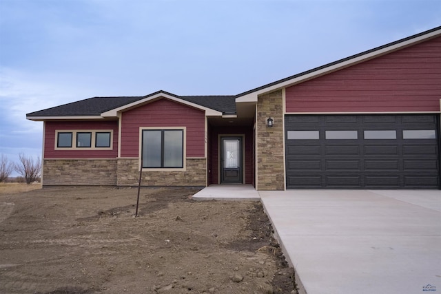 view of front of property featuring a garage