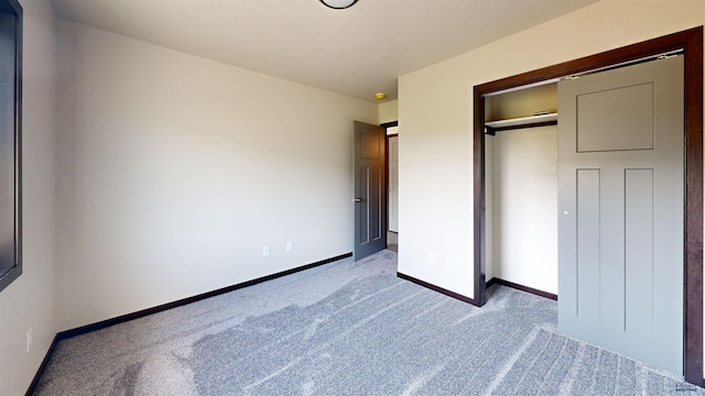 unfurnished bedroom with light colored carpet