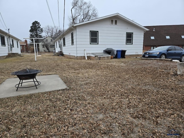20022006 2nd Ave, Rapid City, SD 57702 - view of side of home featuring an outdoor fire pit