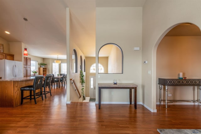 interior space with dark hardwood / wood-style flooring