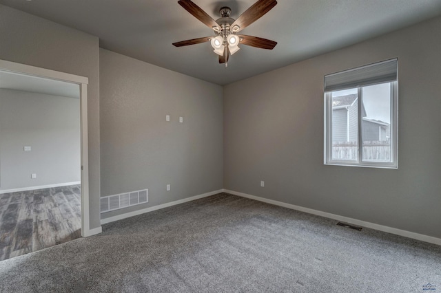 unfurnished room featuring carpet flooring and ceiling fan