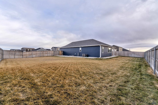 view of yard featuring central AC