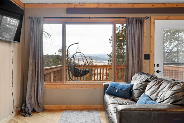 interior space featuring a mountain view and wood ceiling