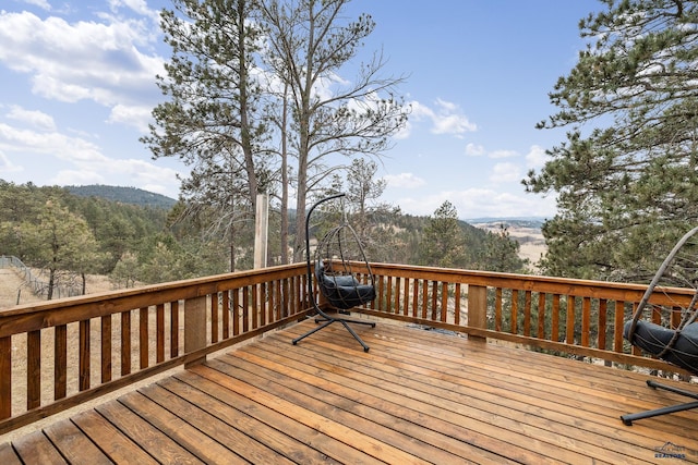 wooden terrace featuring a mountain view