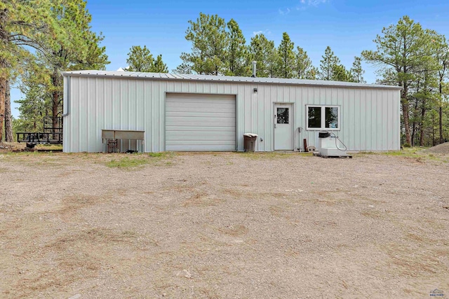 view of outbuilding with a garage