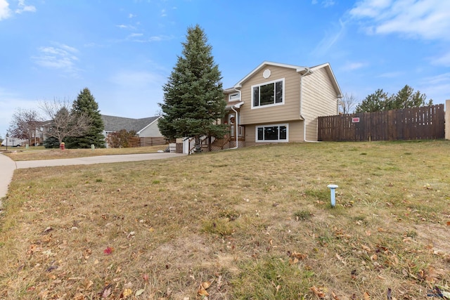 view of property exterior featuring a yard