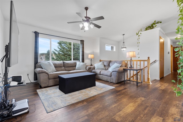 living room featuring dark hardwood / wood-style floors and ceiling fan