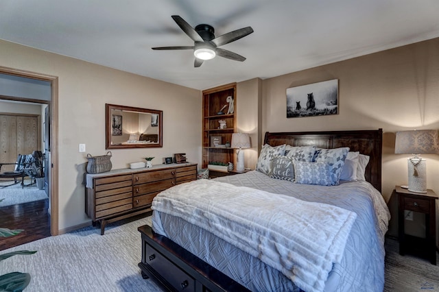 carpeted bedroom with ceiling fan