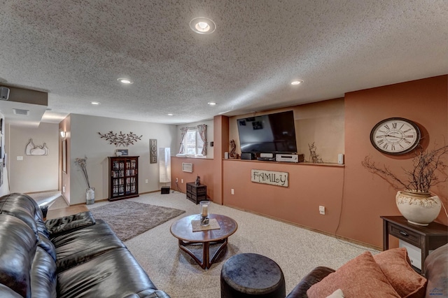 living room featuring a textured ceiling and light colored carpet