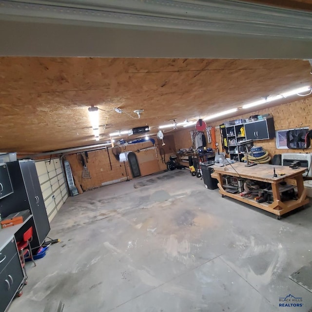 garage with a workshop area