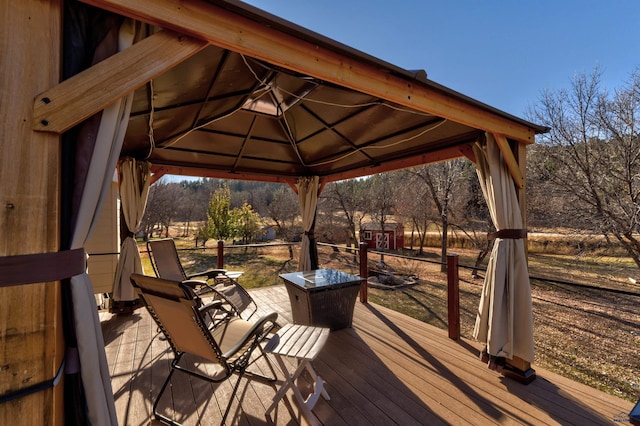 wooden deck with a gazebo