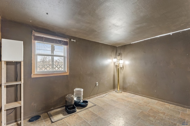 210 E Montana, Rapid City, SD 57701 - unfurnished room featuring stone finish flooring and baseboards