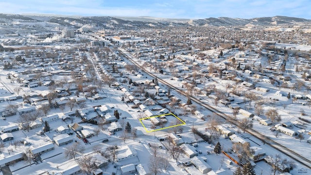 210 E Montana, Rapid City, SD 57701 - snowy aerial view featuring a residential view and a mountain view