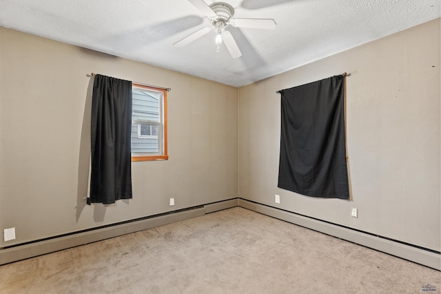 210 E Montana, Rapid City, SD 57701 - unfurnished room featuring a baseboard radiator, light carpet, ceiling fan, and a textured ceiling