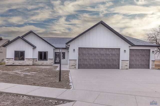 modern farmhouse with a garage